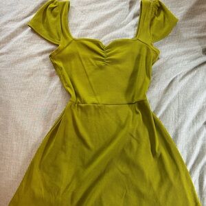 Green capsleeve dress